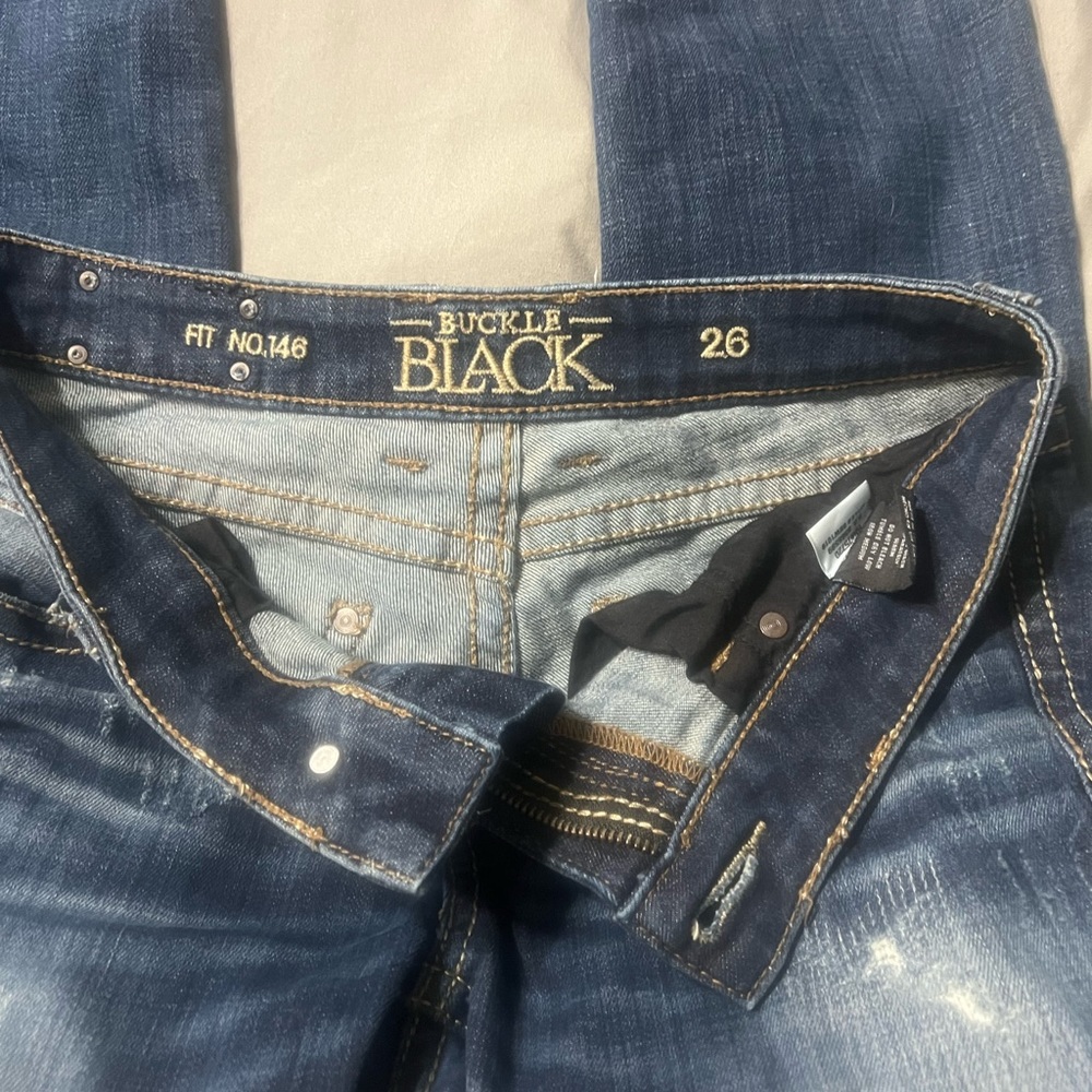 Buckle black jeans